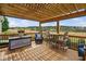 Back porch with pergola and view of yard at 1202 Lexington Ridge Ln, Apex, NC 27502