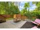 Backyard patio with wooden fence and dining set at 1202 S Bloodworth St, Raleigh, NC 27601