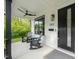 Comfortable front porch featuring rocking chairs and ceiling fan at 1202 S Bloodworth St, Raleigh, NC 27601