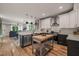 Modern kitchen with stainless steel appliances, a view to the dining area, and butcher block island at 1202 S Bloodworth St, Raleigh, NC 27601