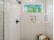 Shower area, which features stunning tile work and a window to provide great lighting and ventilation at 1202 S Bloodworth St, Raleigh, NC 27601