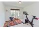 Bright room with desk, window, work out equipment, and space for various activities at 1311 Antler Point Dr, Durham, NC 27713