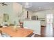 Bright dining area with modern table and chairs, open to kitchen and living space at 1311 Antler Point Dr, Durham, NC 27713