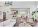 Open concept living space showcasing living room, kitchen with breakfast bar, and adjacent dining area at 1311 Antler Point Dr, Durham, NC 27713
