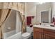 Cozy bathroom featuring a tub and vanity, perfect for relaxation and convenience at 1317 Colonial Club Rd, Wake Forest, NC 27587