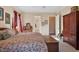 Bedroom with an upholstered bed, wood furniture, and carpet at 1317 Colonial Club Rd, Wake Forest, NC 27587