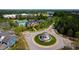 Aerial view of the neighborhood amenities including a pool, clubhouse, and tennis courts at 1322 Regulator St, Raleigh, NC 27603