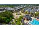 Aerial view of community features, gazebo, clubhouse, pool, residences and landscaping at 1322 Regulator St, Raleigh, NC 27603
