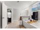 Open bathroom with double vanity, large soaking tub and stylish tile flooring, creating a spa-like retreat at 1322 Regulator St, Raleigh, NC 27603