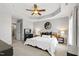 Large primary bedroom suite features a tray ceiling, fan, and ample space for relaxation at 1322 Regulator St, Raleigh, NC 27603
