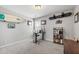 Bedroom or office with a desk, a surfboard, and a snowboard decoration on the wall at 1322 Regulator St, Raleigh, NC 27603