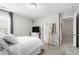 Comfortable bedroom featuring a large window, neutral decor, and a cozy bed for a peaceful night's sleep at 1322 Regulator St, Raleigh, NC 27603