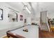 Bright recreation area featuring a pool table and ample space for entertaining, with stairs leading to the next level at 1322 Regulator St, Raleigh, NC 27603