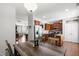Open floorplan featuring an eat-in kitchen with stainless steel appliances and bar seating at 1322 Regulator St, Raleigh, NC 27603