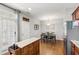 Open kitchen featuring stainless steel appliances and a dining area with a wood table at 1322 Regulator St, Raleigh, NC 27603