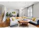 Spacious living room with plush seating, natural light, and stylish decor at 1322 Regulator St, Raleigh, NC 27603