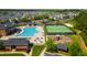 An aerial view of the community pool, tennis court, playground and recreation area at 1322 Regulator St, Raleigh, NC 27603