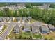 Aerial view of the neighborhood featuring manicured lawns and tree-lined streets at 1410 Arena Ln, Fuquay Varina, NC 27526