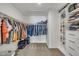 Organized walk-in closet with ample storage for clothing, shoes, and accessories at 1410 Arena Ln, Fuquay Varina, NC 27526