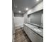 Modern bathroom featuring double sinks, granite countertops, and a shower-tub combination at 146 Starry Sky Dr, Benson, NC 27504