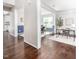 Open-concept living and dining areas with hardwood floors and ample natural light at 15 White Spruce Ct, Durham, NC 27703