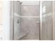 New shower with a built-in bench and decorative tile accent at 16 Decatur Dr, Fuquay Varina, NC 27526