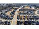 The community neighborhood is showcased in this aerial view, featuring sidewalks and manicured landscaping at 1820 Grassy Falls Ln, Wendell, NC 27591