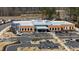 Aerial image of the modern designed WakeMed Emergency facility with an expansive parking area at 1820 Grassy Falls Ln, Wendell, NC 27591