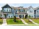 Charming townhome exteriors showcase colorful facades and well-manicured landscaping at 1820 Grassy Falls Ln, Wendell, NC 27591