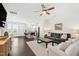 Spacious open-concept living area showcasing seamless flow between living room, kitchen, and dining area at 1820 Grassy Falls Ln, Wendell, NC 27591