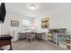 Functional home office with modern desk, natural light, and comfortable seating at 1820 Grassy Falls Ln, Wendell, NC 27591