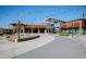 Open-air town center with modern architecture, pedestrian walkways, and a variety of shops and eateries at 1820 Grassy Falls Ln, Wendell, NC 27591