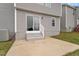 Backyard featuring a patio area accessible through sliding glass doors at 197 Scranton Ct, Cameron, NC 28326