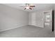 Cozy bedroom with neutral carpet, paint, and a ceiling fan at 197 Scranton Ct, Cameron, NC 28326