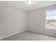Cozy bedroom with neutral walls, carpet flooring and a bright window at 197 Scranton Ct, Cameron, NC 28326