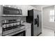 Kitchen featuring stainless steel appliances and white cabinets at 197 Scranton Ct, Cameron, NC 28326