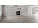 Spacious living room featuring light wood floors, a fireplace, and an open floor plan at 197 Scranton Ct, Cameron, NC 28326