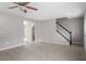 Bright living room with light wood floors and staircase at 197 Scranton Ct, Cameron, NC 28326
