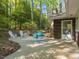 Backyard area with a patio and plenty of room to enjoy the outdoors at 203 Wood Cir, Chapel Hill, NC 27514