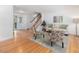 Open living area with hardwood floors, neutral decor, and ample natural light at 203 Wood Cir, Chapel Hill, NC 27514