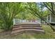 Exterior view of a wooden deck and yard, offering an outdoor living space at 204 Black Forest Dr, Clayton, NC 27527