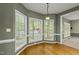 Bright dining area with large windows and hardwood flooring at 204 Black Forest Dr, Clayton, NC 27527