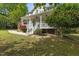 Spacious two-story home with a covered front porch and landscaped yard at 204 Black Forest Dr, Clayton, NC 27527