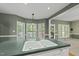 Kitchen island sink with bright window view and open to dining area at 204 Black Forest Dr, Clayton, NC 27527
