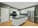 Well-equipped kitchen with stainless steel appliances and central island sink at 204 Black Forest Dr, Clayton, NC 27527