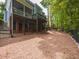 Exterior of home showing tiered decks in a wooded backyard at 204 Flint Point Ln, Holly Springs, NC 27540