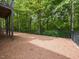 Backyard with a fenced perimeter and a view of the wooded area at 204 Flint Point Ln, Holly Springs, NC 27540