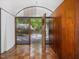 Inviting modern entryway with wood accents, a view of landscaped garden and natural light at 205 Wood Cir, Chapel Hill, NC 27514