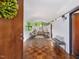 Stylish modern living room with hardwood floors, curved ceilings and large windows at 205 Wood Cir, Chapel Hill, NC 27514