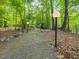 Gravel path with modern lighting fixtures that lead to the property at 205 Wood Cir, Chapel Hill, NC 27514